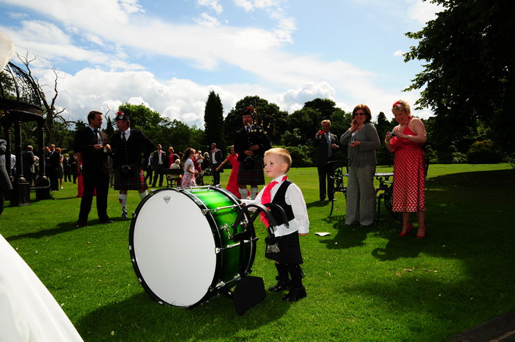 Kid playing drum at wedding